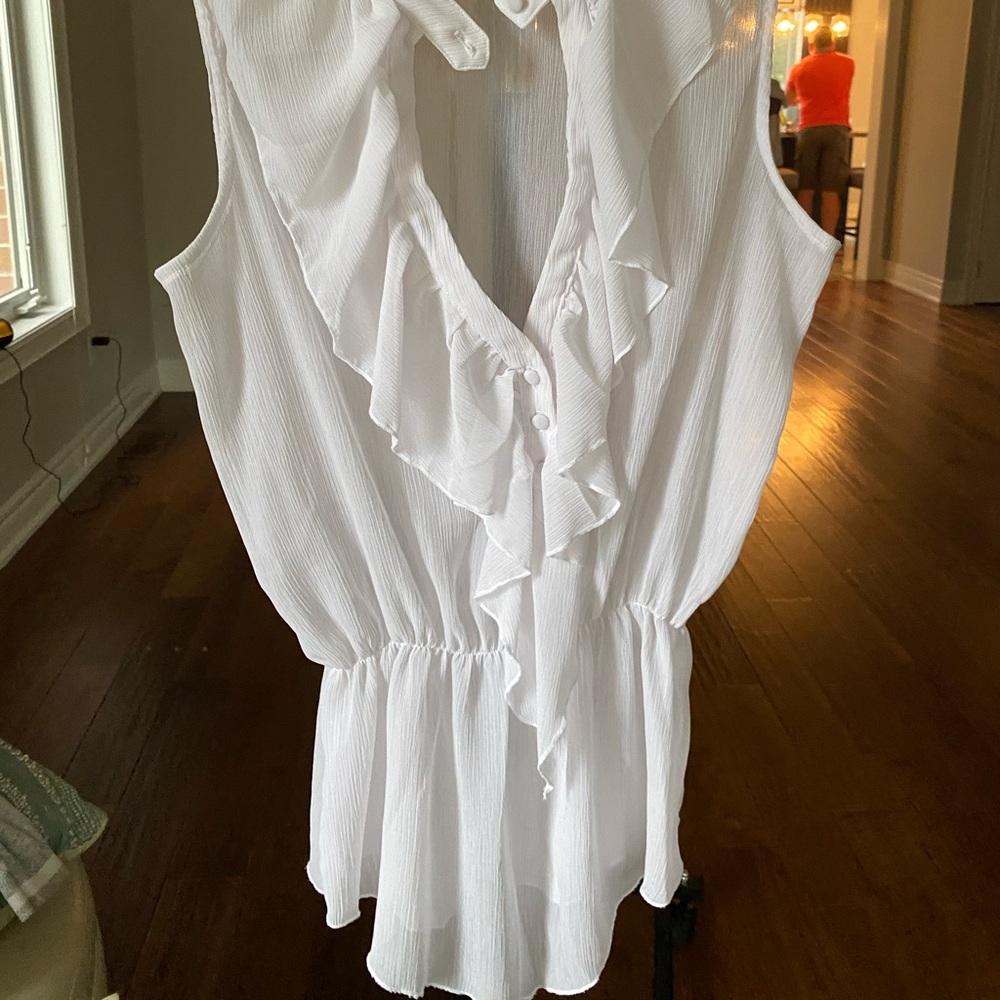 Sheer sleeveless blouse